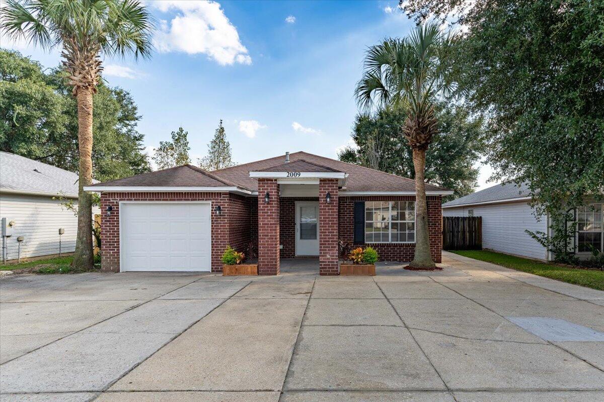 Welcome to this beautifully updated all-brick home, featuring 3 bedrooms, 2 bathrooms, and 2 versatile bonus rooms perfect for an office, playroom, or guest space. With fresh paint throughout and brand-new flooring, this home feels modern and inviting. The open floor plan offers seamless flow between the living spaces, while the kitchen shines with stunning new stainless steel appliances, granite countertops, a stylish backsplash, and new cabinets--perfect for any home chef. Both bathrooms have been tastefully refreshed, with the master bathroom showcasing a gorgeous tiled walk-in shower and new vanity. Move-in ready and packed with upgrades, this home is ready to impress!