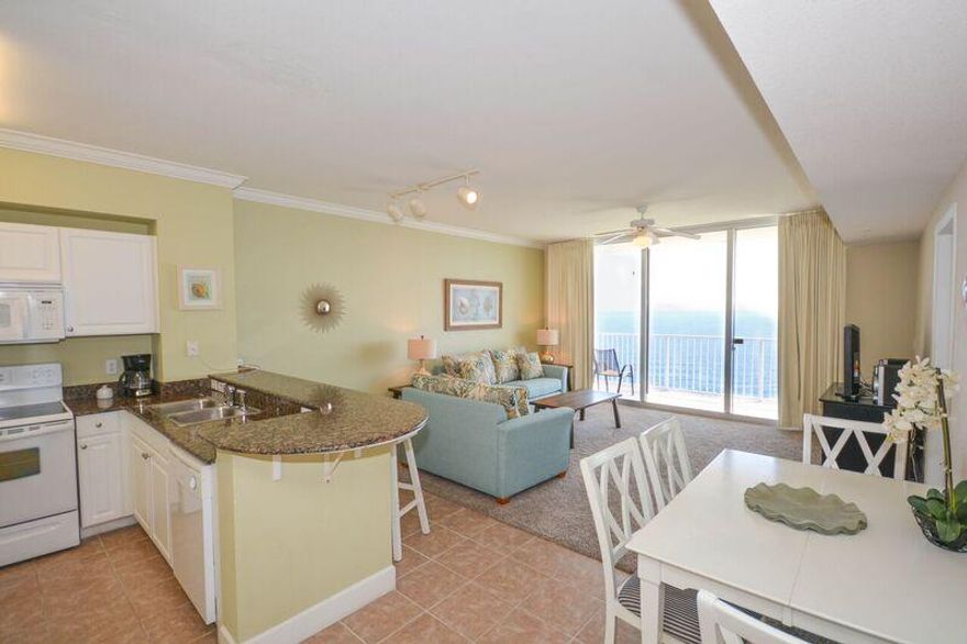 ATTENTION INVESTORS! LOWEST PRICED 'L' Plan at Tidewater! Recently updated with new furnishings, this gulf front condo with 923 sq ft of spacious living area at Tidewater Beach offers a unique plan with the living room and master suite opening onto a 30' wide balcony! Similar plans have generated more than $35K in gross annual rental income. Other features include a bunk room with closet and access to a second full bath, 9' ceiling with crown molding, granite kitchen countertops with double door refrigerator with water and ice, and carpet and tile flooring. Tidewater offers resort style amenities including private access to 636' of pristine beachfrontage, two lagoon style gulf side pools, a heated indoor pool,state of the art fitness center with Roman spa and sauna, two kid's arcade,