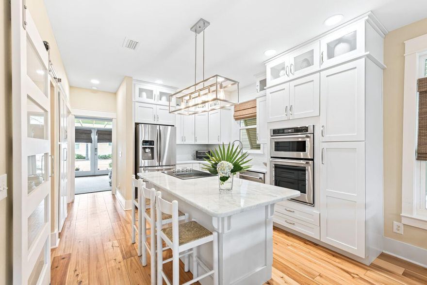 This beautifully maintained beach home features scenic gulf views from the third floor and is ideally located within walking distance of popular 30A beach communities and the Seacrest Beach amenities. Every whim is catered for in this spacious five-bedroom, fully furnished, vacation home, which includes two family rooms and two master suites - both with a private deck. Open main living areas feature beautiful hardwood flooring, and the kitchen offers granite countertops, stainless steel appliances, and a large island. Additional space includes a lower level bathroom and master bedroom.  On the first floor you will find an additional cozy living space with a custom convertible queen bed and full bathroom for the extra family or friends.