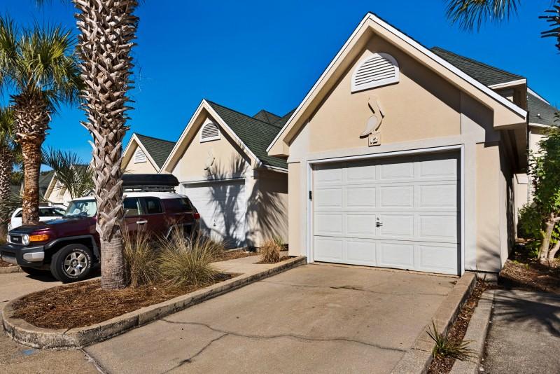Great ''Harbor District'' location! This newly renovated END UNIT is within walking distance to Destin's restaurants, nightlife and harbor. New carpet, new paint, new kitchen cabinets, and new light fixtures just installed! Kitchen features stainless steel appliances, and cabinets have a lazy susan and pot drawers with soft close drawers/doors. Tile throughout downstairs and in upstairs bathrooms. Oil rubbed bronze fixtures throughout. Impress your guests with white shaker kitchen cabinets that go all the way to the ceiling and the Pinterest worthy dining light fixture! Granite countertops. Refrigerator, washer and dryer included. Floored in attic space in garage.