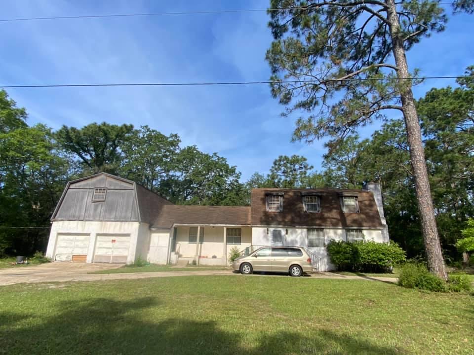 Investor Special With Land FOUR Minutes from Hurlburt Back Gate!!! This five bedroom, 4 bath home on almost an acre of property is just outside the back gate of Hurlburt on a quiet cul de sac.This home needs a complete renovation, but can be turned into an absolutely stunning home. There has been a foundation inspection and the I beams that run the length of the home are in perfect construction. This home may be considered for the newly reinstated VA Renovation loan or a Conventional 203.