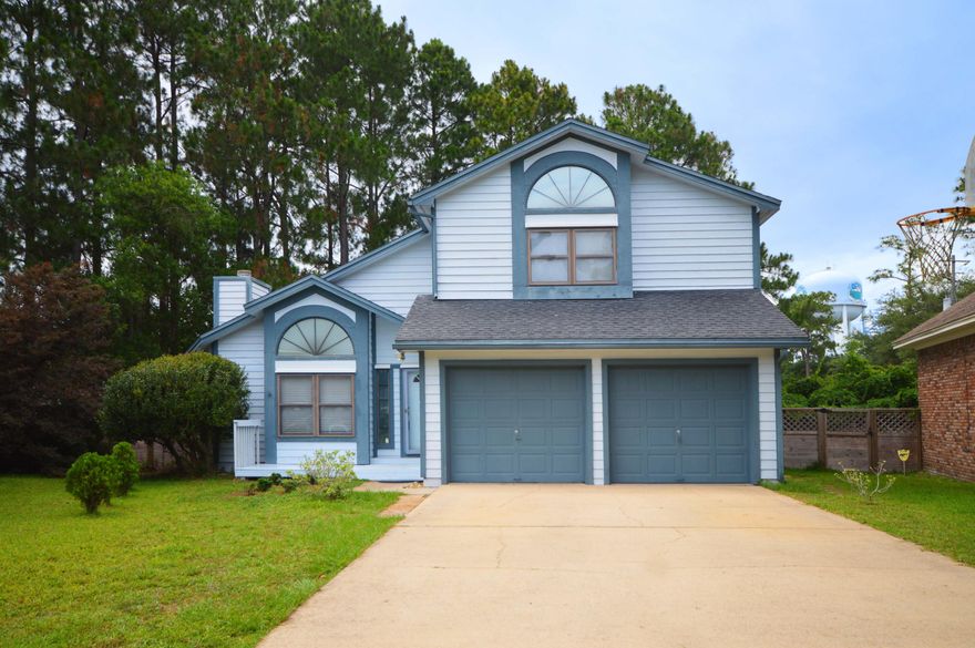 3 Bedroom, 3 Bathroom Cul-De-Sac Retreat Close to Everything- Plus, There's A Bonus Room.Your new home is between Eglin AFB and Hurlburt Field, and just miles from Fort Walton's beaches and businesses, but nestled on your quiet cul-de-sac, you would never know it.Exterior accents like the half-round, spoked pediment windows and a two-car garage catch your eye before you even set foot into your new home. The open floor plan of the spacious living room coupled with vaulted ceilings and the light from the windows and back door of the dining room present a warm and natural flow. The kitchen has a new stainless-steel refrigerator and a gas stove.