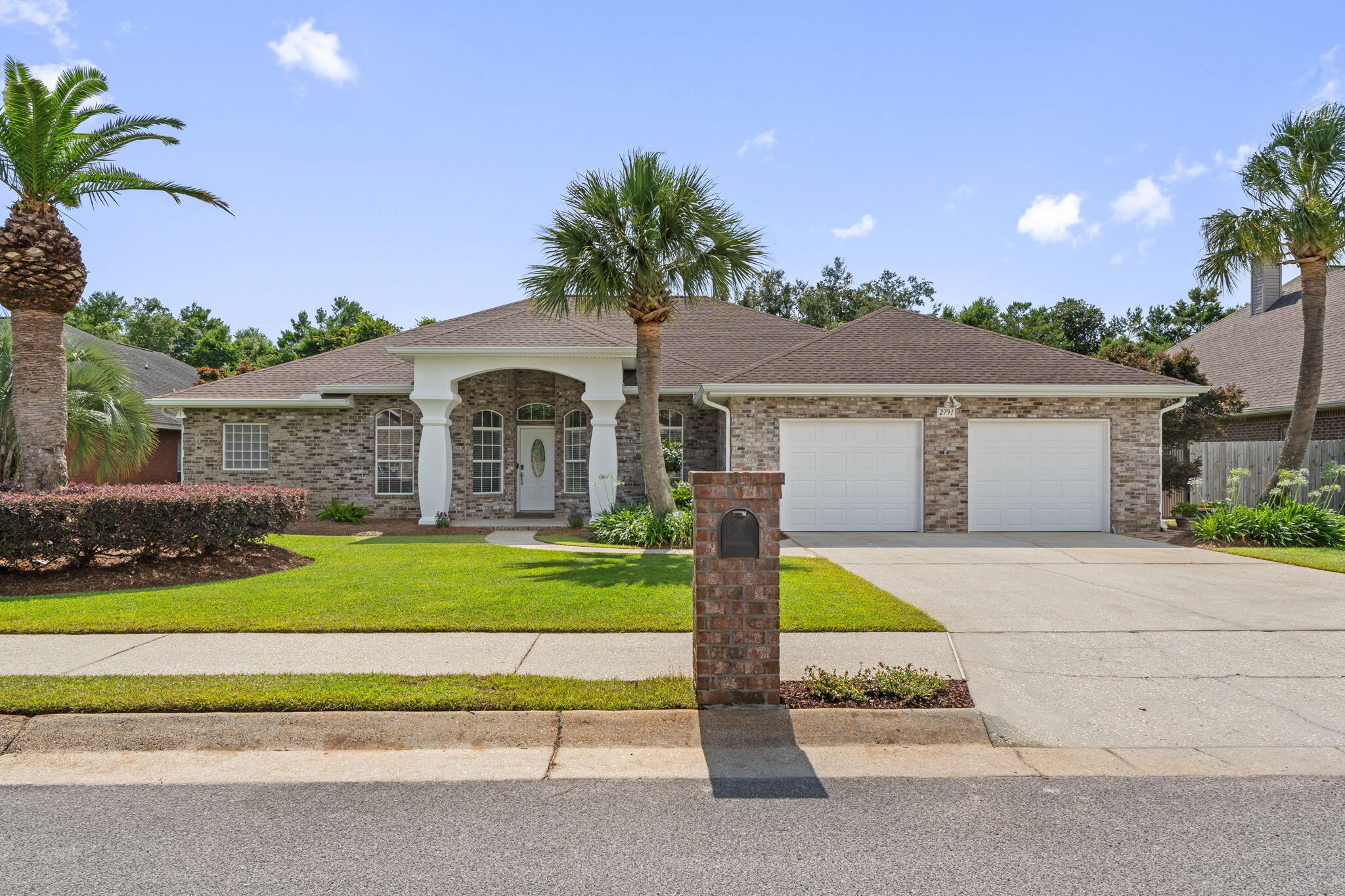 Welcome to a Gary Brown custom home in one of Navarre's most desirable neighborhoods! Nestled in Grand Bay Estates complete with sidewalks, light posts, and exclusive access to a private neighborhood dock on East Bay, this beautifully maintained residence combines timeless craftsmanship with modern comfort. Boasting 4 spacious bedrooms, 3.5 bathrooms, and 2,777 square feet of thoughtfully designed living space, this home offers the perfect layout for both relaxing and entertaining. At the heart of the home is a chef's dream kitchen with large center island, upgraded finishes, and plenty of space for gathering with friends and family. Step outside into your private backyard oasis, featuring a sparkling saltwater pool with a screen enclosure, a built-in grill, and IntelliBrite LED color-changing lights, set the scene for unforgettable evenings under the stars. Inside, you'll find that two of the guest bedrooms each have their own en-suite bathroom, offering privacy and comfort for family or visiting guests. The oversized garage provides ample room for vehicles, storage, or even a workshop setup. Lovingly cared for by its original owner, this custom home showcases thoughtful upgrades, quality finishes, and an easy, coastal elegance throughout. Whether you're hosting a summer poolside BBQ or taking a peaceful sunset stroll to the dock, this home offers the relaxed Navarre lifestyle you've been dreaming of.
Don't miss your chance to own this slice of paradise and schedule your private tour today!