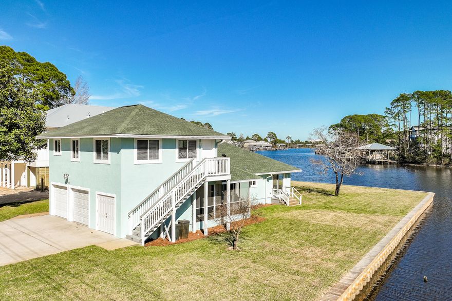 Magnificent coastal estate situated on a manicured lot with 220' of waterfront frontage on coveted Buck Bayou! From this ultimate boater's paradise you can easily navigate the beautiful waterways from Choctawhatchee Bay to the Gulf of Mexico. With one of the largest waterfront footages in the Mack Bayou area, this impressive, spacious home affords peaceful waterfront living in one of the most desirable areas in Santa Rosa Beach. 
The picturesque views of the water from inside the home, coupled with spacious outdoor living areas offer a peaceful harmony that will beckon you home again and again. This property is a rare find as it sits with a 220' of brand new riprap sea wall (see attachment in documents) on tranquil Buck Bayou. MORE Imagine living the boating lifestyle, experiencing scenic beauty, spectacular sunrises, sharing special gatherings and listening to fish tales shared with others in the evenings. Clean your fish, cook them on the grill and enjoy your meal sitting on your patio! In addition to boating, it is an ideal launch point for other water-based activities including canoeing, kayaking, paddle boarding, fishing or simply enjoying nature amongst the ample wildlife that inhabit the area..

The outside gardens were professionally landscaped and maintained with a private well sprinkler system professionally installed with Colson Custom Cuts, Inc. The front of the house showcases a 2-car garage with a full size storage area. 
While you can't miss the eloquent views of Buck Bayou as you enter the front door, the lower story features an office off the foyer, 2 guest bedrooms on the north side and the master suite on the south. Further into the home, you enter the grand living room with 180 degree views of the bayou with a sitting area that flows nicely into the dining and kitchen area.
Master en suite features a large walk-in closet, walk-in shower and a private patio overlooking the bayou.
A separate one bedroom apartment with a full kitchen and bath with a private entry is located above the garage. This makes great mother-in-law suite, or without being in an HOA, you are free to rent this apartment short-term or long-term as you please. Previous owners have rented this space for $1400 a month in a long-term lease.