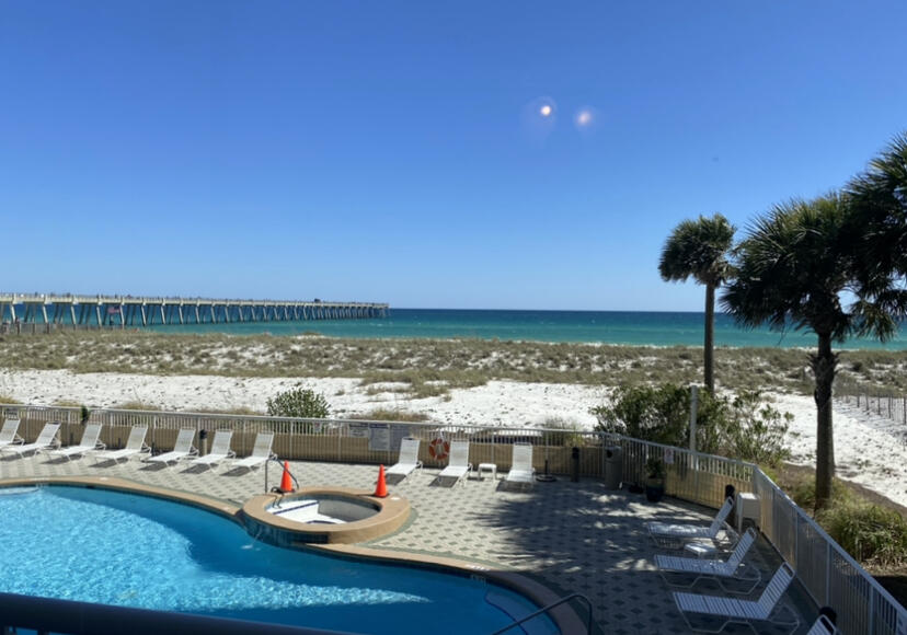 Meticulously maintained and updated fully furnished gulf front condo.  3 bedroom - 3 bath corner unit with 12-ft high ceilings & wrap around balcony is ideal for relaxing and entertaining guests.  Floor to ceiling sliding glass doors in the living area showcase the turquoise waters of the Gulf of Mexico.  Kitchen boasts stainless steel appliances, granite countertops & a pantry.  Full size washer & dryer make doing laundry easy.  Master Bedroom is waterfront with sliders to access the balcony, new LVP flooring, & a walk in closet.  Master Bath has a double vanity, garden tub and separate shower.  Mattresses were recently replaced. Sleeps 6 to 8 comfortably.  Conveniently located on the amenity floor close to the general store and gym. Overlooks one of 3 pools (heated pool rotates annually)