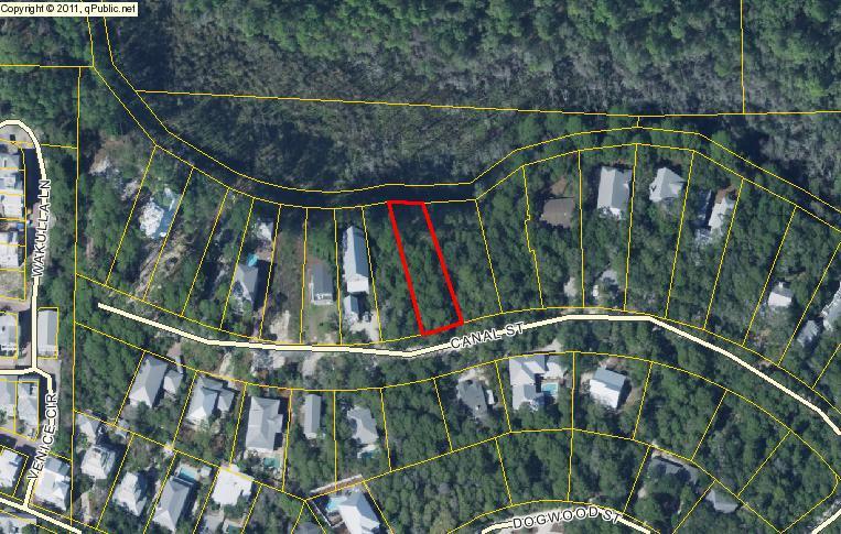 This is a canal front lot in Seagrove Shores 4th Addition. Large lot with beautiful trees and quiet neighborhood. The canal goes all the way to Western Lake and is a beautiful quiet serene environment. Build your permanent home on this lot or second home. Off the main roads but so close to Seaside, restaurants, shopping and the beautiful white sand beaches. Walk or bicycle to any of the locations.
