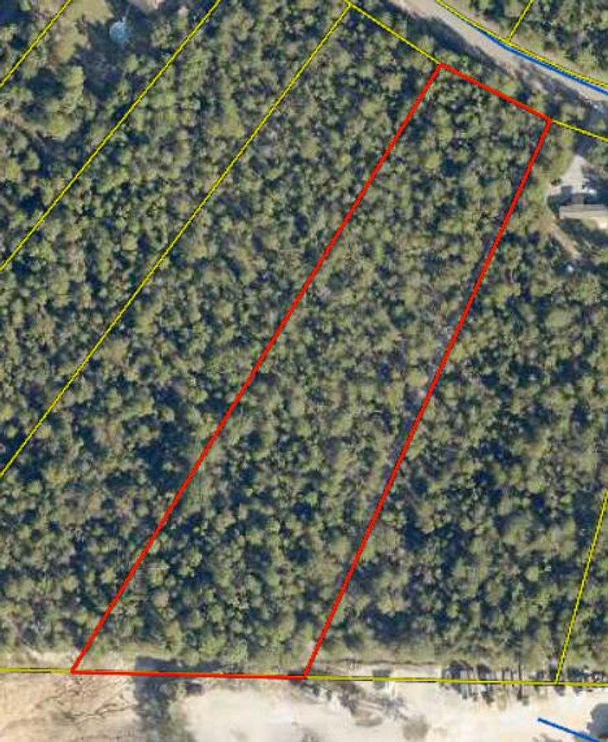 4.12 Acre vacant, wooded lot on a paved road in an unrecorded subdivision, in the Mossy Head area of DeFuniak Springs, it is approx 13 miles to downtown DeFuniak Springs, approx 18 miles to Crestview, approx. 23 miles to Niceville, approx 5 miles to Blackstone Golf Course & I-10 in Mossy Head, approx 30 miles to Eglin AFB, approx 41 miles to Hurlburt, approx 26 miles to Duke & 7th Special Forces, approx 35 miles to Emerald Coast beaches. Appears to be high and dry in flood zone X per the Walton County GIS mapping (does not appear to have any wetlands) offering a nice clearing for a homestead. Mobile homes allowed. Power runs along Seven Oaks Road however a well and septic tank would be required. Buyer needs to verify dimensions, building codes and/or zoning regulations with proper local authorities to ensure buyer will be able to utilize the property for intended use. Information contained within this listing is deemed to be accurate but is not guaranteed.