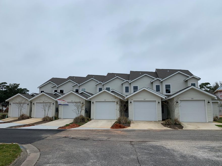 BACK ON MARKET AT NO FAULT OF SELLER.  Step into a beautiful, two story 3 bedroom, 2.5 bath townhome with attached garage. The interior offers 9' ceilings, plush carpet in bedrooms, waterproof luxury vinyl plank flooring downstairs and in bathrooms, and granite counters throughout. The kitchen features white cabinets, stainless appliances, and island. The master bedroom is on the first floor and lets on to a lovely patio to expand the living area. The master bath features a large, beautiful tile shower and a walk-in closet. Both full bathrooms offer double vanities and the powder room is located off of the living area. There is recessed lighting throughout, a laundry area, and ample closet space. Ownership includes access to the