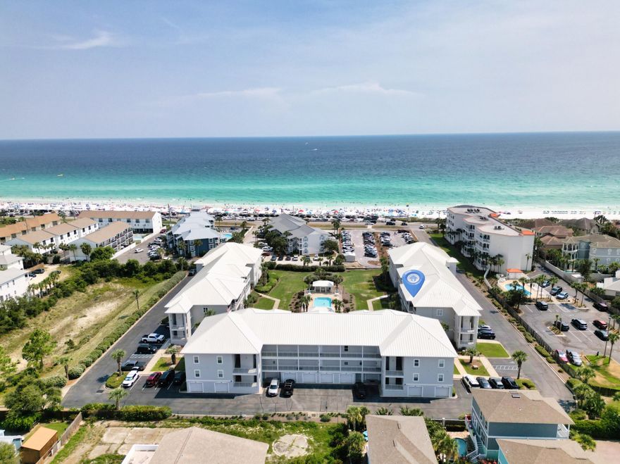 Welcome to Pavillion Palms 201C, a true coastal gem nestled in the heart of Miramar Beach, FL. Embrace the breathtaking beauty of the Gulf of Mexico from the comfort of your own private oasis. This impeccably remodeled 2-bedroom, 2-bathroom condo offers the ultimate beach life living experience. Step inside and be greeted by an inviting open-concept living space freshly painted with new luxury vinyl flooring throughout, new can lighting, new furniture, and tastefully decorated. The kitchen has been thoughtfully updated with modern appliances, under cabinet lighting, newly painted cabinetry, and quartz countertops, making it a joy to prepare delicious meals or beach snacks for family and friends.The breakfast bar invites socializing and doubles as a convenient dining spot, but you'll also find a dedicated dining area for more formal gatherings. The primary bedroom offers a serene escape with its own private access to the balcony, allowing you to wake up to the sunrise and savor the salty breeze. The ensuite bathroom boasts a luxurious feel with a new toilet, quartz countertop, and elegant finishes. The second bedroom is equally charming providing ample space for guests or family members. A second full bathroom tastefully updated is just steps away for added convenience. Imagine lazy afternoons spent on the balcony, relishing the panoramic vistas, or head down to the sugar-white sands and crystal-clear waters for a day of sunbathing, swimming, and beachcombing. As part of the community, you'll have access to a community pool, TWO CAR garage with extra refrigerator, separate oversized storage closet, well-maintained common areas, and beach access directly across the street. With the renowned Scenic Hwy 98 location, you'll find yourself within easy reach of a plethora of dining, shopping, and entertainment options. Whether you're looking for a permanent residence, a vacation retreat, or an investment opportunity, this remodeled Gulf View condo has it all. Don't miss your chance to own a piece of paradise on the Gulf Coast! Seller is a licensed out of state REALTOR.