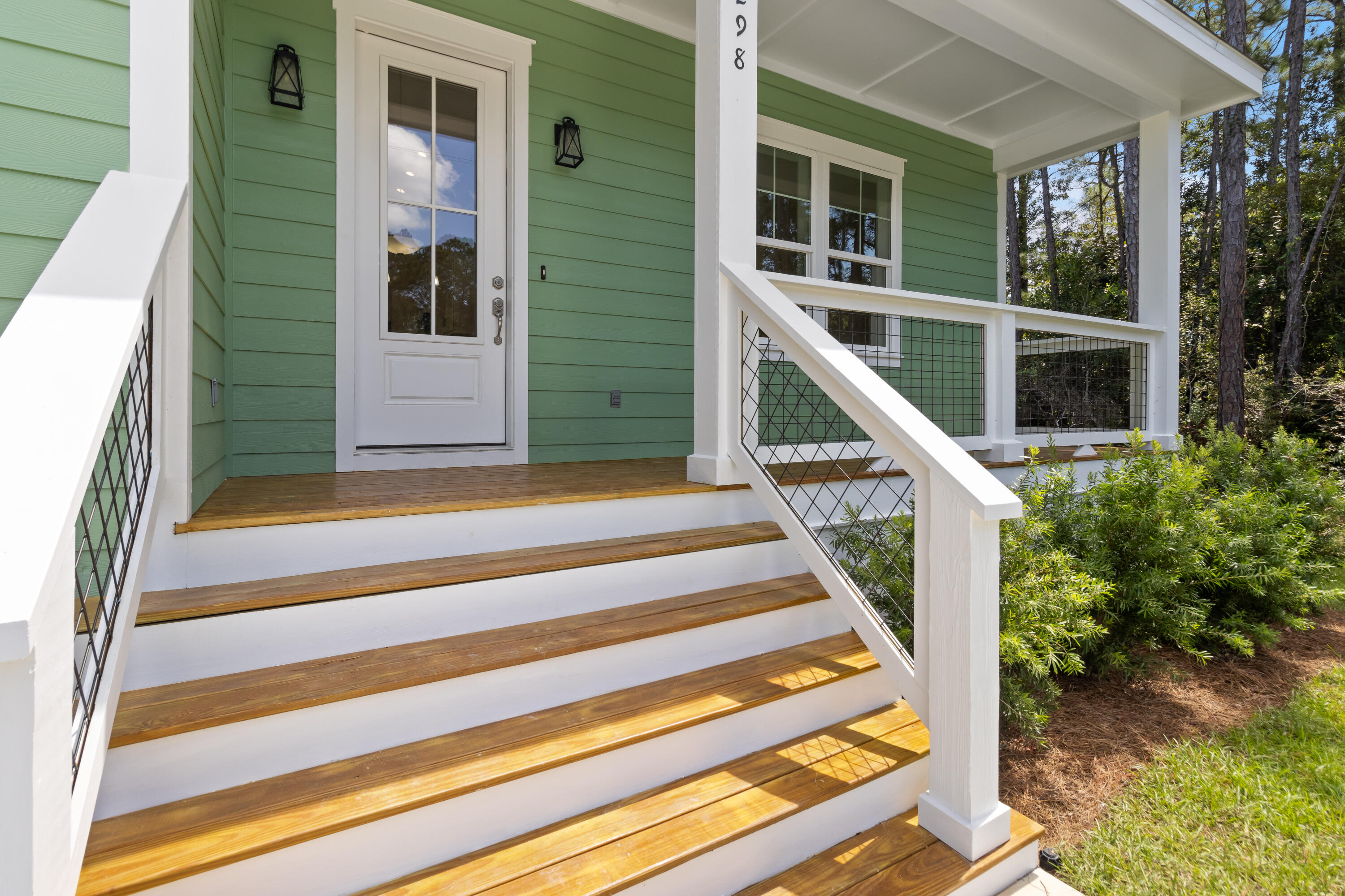 This beautifully finished 3 bed, 2 bath home offers 1,398 sqft of stylish comfort just 10 minutes from the beach! Featuring LVP flooring, tile showers, shiplap accents, vaulted and trey ceilings, crown molding, and a fenced backyard -- all with no HOA. Prime location near the bay and the future Chat Holley park & amphitheatre makes it perfect as a full-time home or a high-performing rental! Construction complete as of 9/1/2025! Seller will install a wood privacy fence with an acceptable offer.