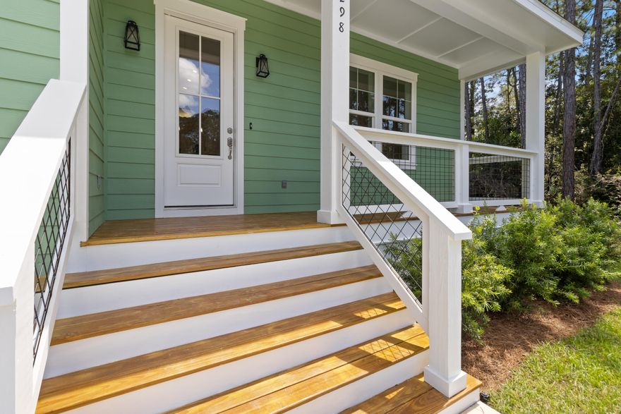 This beautifully finished 3 bed, 2 bath home offers 1,398 sqft of stylish comfort just 10 minutes from the beach! Featuring LVP flooring, tile showers, shiplap accents, vaulted and trey ceilings, crown molding, and a fenced backyard -- all with no HOA. Prime location near the bay and the future Chat Holley park & amphitheatre makes it perfect as a full-time home or a high-performing rental! Construction complete as of 9/1/2025! Seller will install a wood privacy fence with an acceptable offer.
