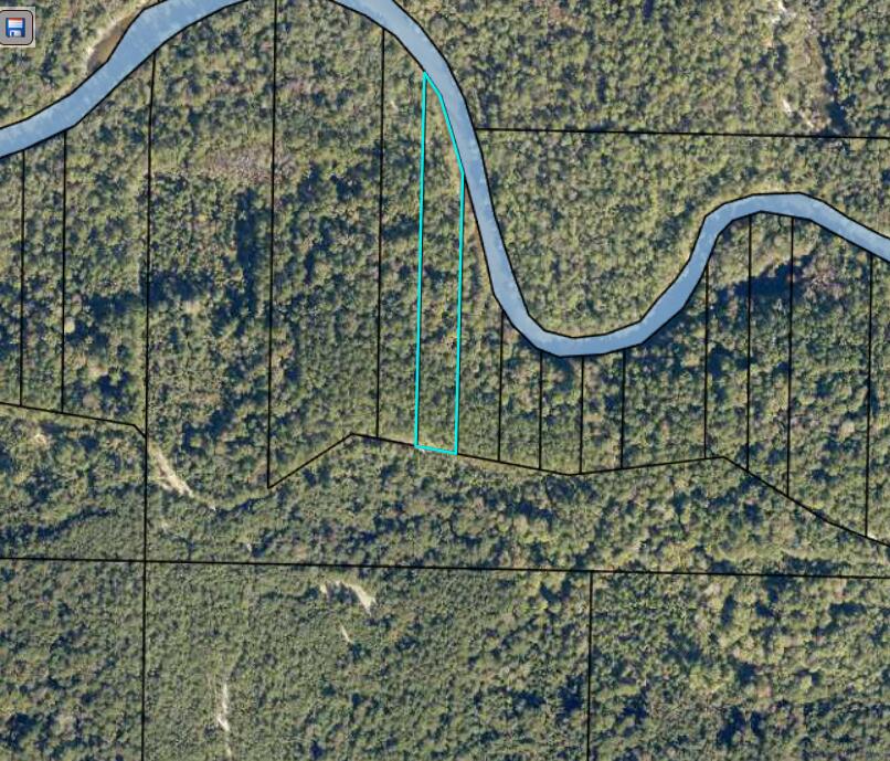 2.5 acres on Shoal River~ Build your dream home or your get away~ There is a deeded easement to the property and it is not drivable at this time, you will need to walk to the property~