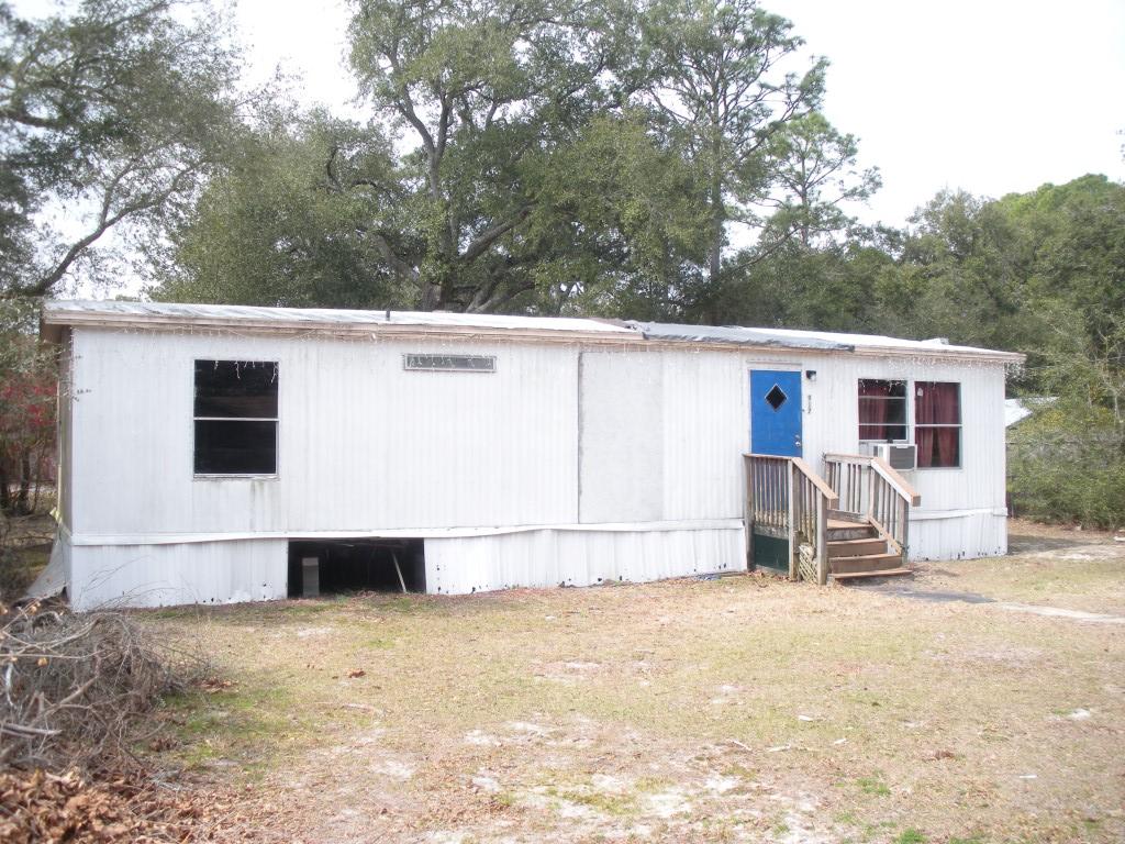 Short Sale on buildable lot! Do not go into existing structure, as it is not livable. If you would like to build the home you design, this lot is for you. The proximity to base is excellent, as it is to Florosa Elementary! The lot is being sold ''As-is.'' Make your offer, today! Cheers!