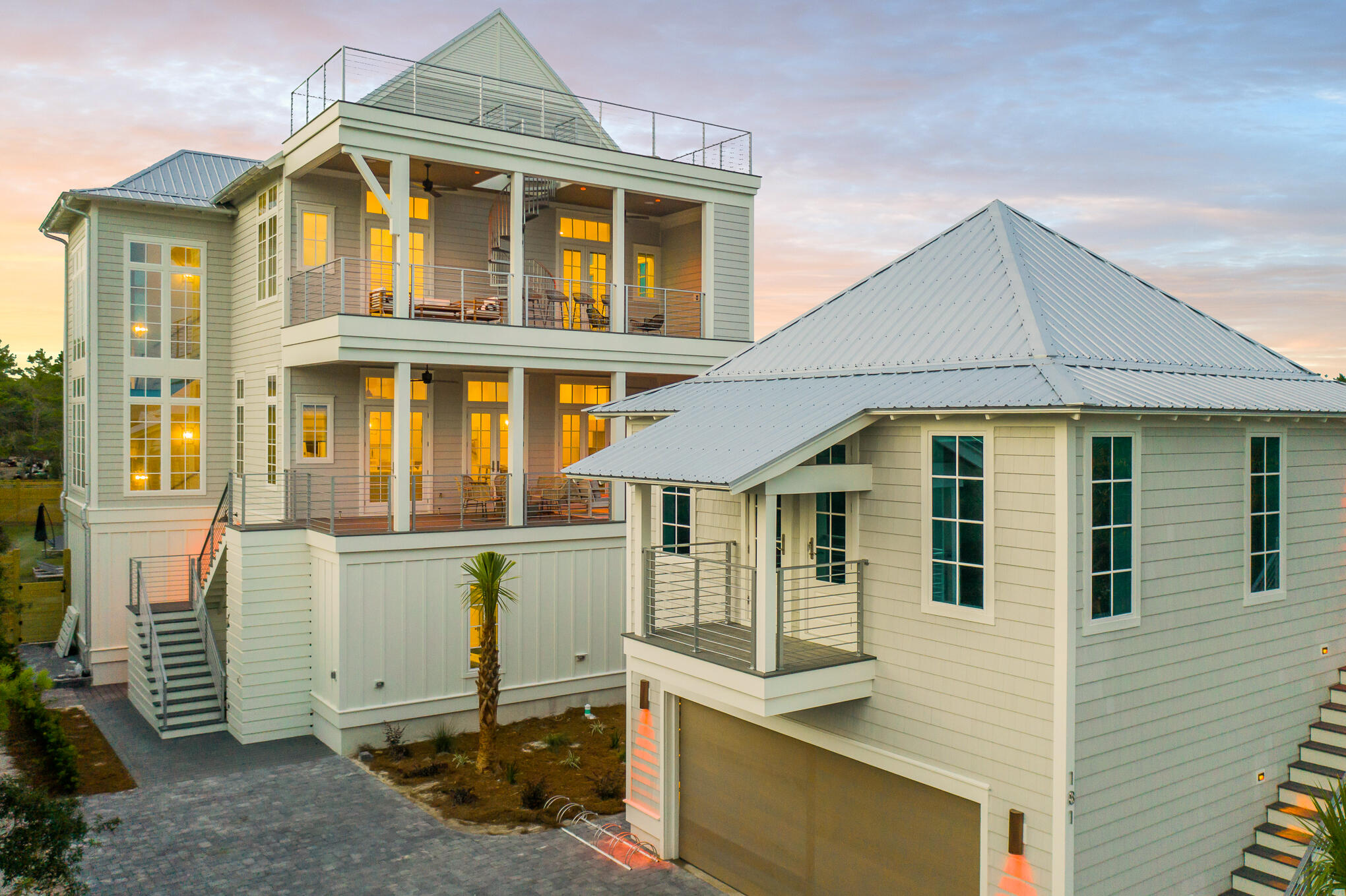 Experience the ultimate vacation experience in this uniquely designed beach sanctuary! Incredible gulf views from both the second, third, and forth floors of the property offer the opportunity to enjoy the beautiful emerald waters right from your own porch. Astounding architecture paired with a flawlessly planned floorplan create space for large gatherings of families and friends to experience a true 30A retreat. Features of the property include a grand great room with dining for the entire party, a breath-taking 4th level sky deck, a huge private resort-style pool, incredible outdoor living, a separate detached carriage house, parking for over eight vehicles and much more. Step into the first floor of the property to find a space created for the kids in the family as well as the young at