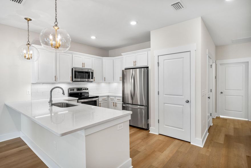 MOTIVATED SELLER! Discover the ultimate lakeside lifestyle at this spacious 3BR/2.5BA residence in Miller's Landing, a vibrant community offering direct access to Lake Powell, just moments from the beaches, shopping, and dining along 30A and West Panama City Beach. This spacious townhome combines elegant design with modern comforts, including luxury vinyl plank flooring throughout, airy 9-foot ceilings, and beautiful quartz countertops. The reverse floor plan is designed for both privacy and convenience: the main living area, a primary suite with elegant ensuite, and a half bath, are situated on the second level, while two additional bedrooms and a full bath are located on the first level. With a one-car garage and two generously sized covered balconies, you'll find thoughtful touches at every turn. Enjoy an active, coastal lifestyle with community amenities like a sparkling lakefront pool and a convenient day dock perfect for launching kayaks or paddleboards directly into Lake Powell. A public boat ramp just a block away making it easy to launch and enjoy larger watercraft. Offering an outstanding value, make this Miller's Landing townhome your serene retreat by the lake.
