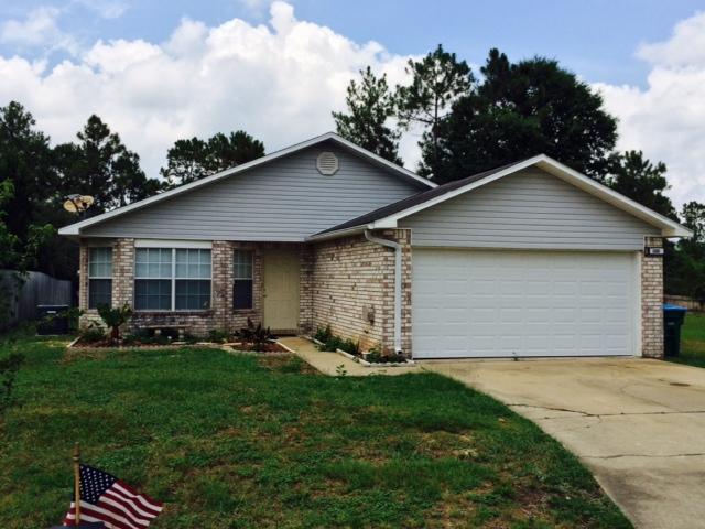 South of I-10 in Crestview. Great location!! This beautiful home has open vaulted ceilings in Great Room, Kitchen & Dining area as you enter the foyer. Open design with plenty of room for get-togethers. Large eat-in Kitchen features white cabinets, tile flooring, island, breakfast bar and white appliances. Split bedroom design with Master Bedroom to back of house and other two bedrooms to the front. Inside Utility Room plus a two car garage. Entertain friends in the backyard with an open patio and deck. Storage shed, two car garage and more. Pet considered on case by case basis.