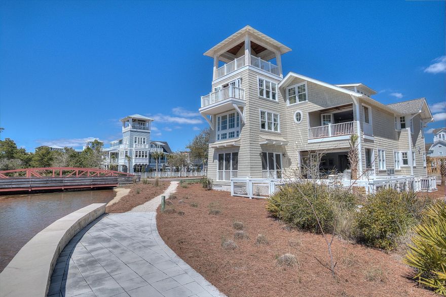 There are those homes that epitomize beach living along 30a and now in Watersound Beach 184 E. Yacht Pond Lane is that house. Having been built upon one of the most unique and inspired lots in all of Watersound Beach, has given life to a floor plan that does just that. Positioned to take advantage of its unique placement on the yacht pond, each level is blessed with water views, whether it be the ripples from the calming pond or the turquoise sheen of the Gulf of Mexico, water views are at every turn. With architecture by Harrison Design Associates and brought to life by Magnolia House Designs of Atlanta, the emphasis is on family and beautiful functionality. The focus of the home was to make the living spaces extensions of the magnificent Watersound Beach surroundings.