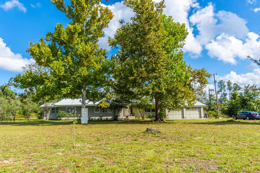 Spacious home located on a 2 acre lot. This house offers 3 spacious bedrooms and 2 bathrooms, but has two bonus rooms that could easily be used as bedrooms. This home offers spacious bedrooms and ample amounts of closet and storage space. New roof was added in May 2019. With a little bit of TLC this will be a gorgeous home!