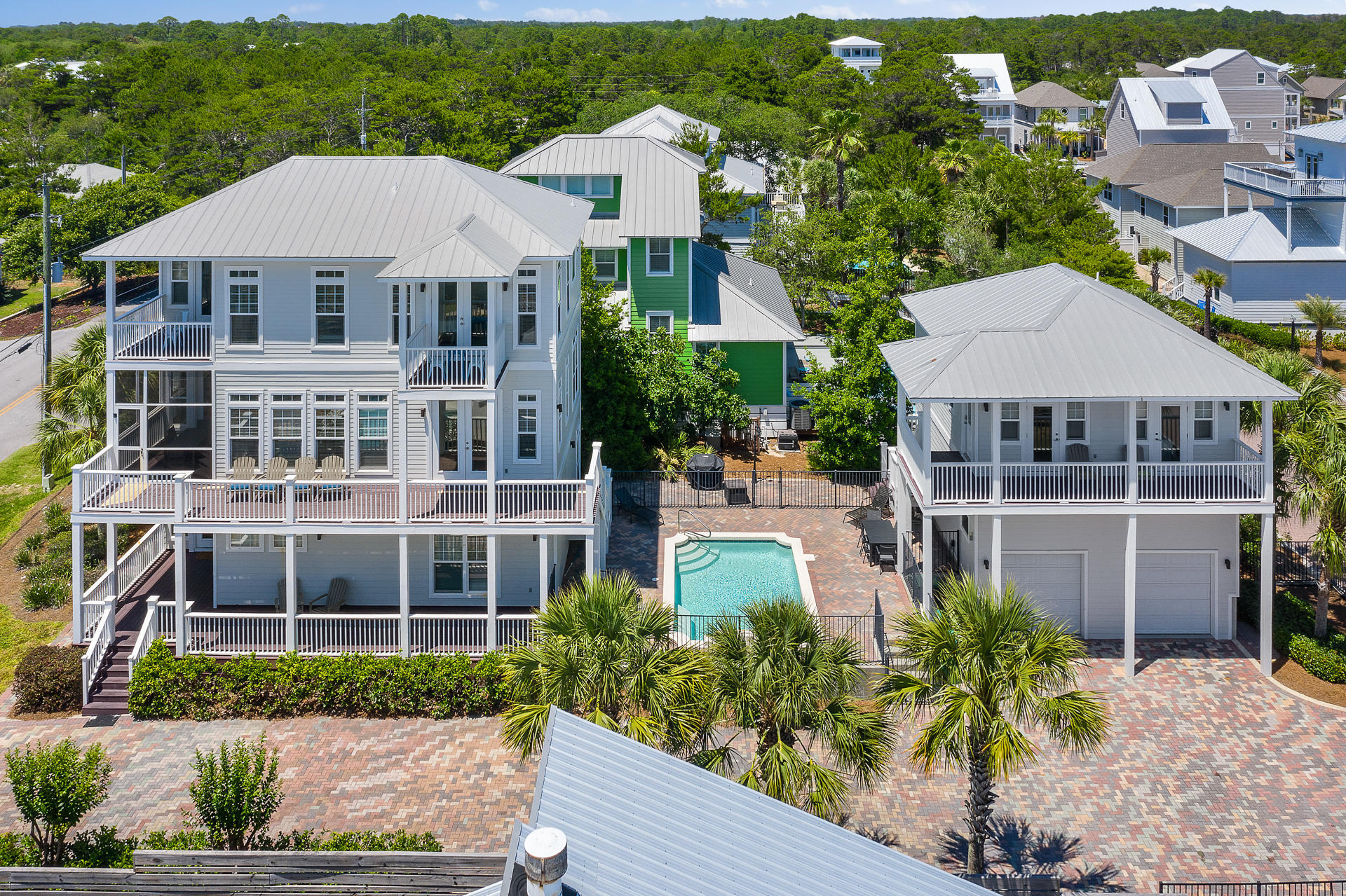 162 Hilltop is an Investors Dream Home! This property provides 8 Bedrooms, 6 in Primary Home and 2 in Carriage House and can easily sleep up to 30 People. A pool in the center courtyard provides the outdoor living space desirable for the 30a lifestyle and is heated for the cooler months. This luxury property is situated high to take advantage of Gulf Views from both the second and third stories. A BRAND NEW beach access with restrooms, shower, and wheelchair ramp has just been completed right at the end of the street, Stinky's Fish Camp restaurant is walking distance, or Hop on the Golf Cart for a quick trip to Gulf Place or the Santa Rosa Golf and Beach Club for additional shopping and restaurants.