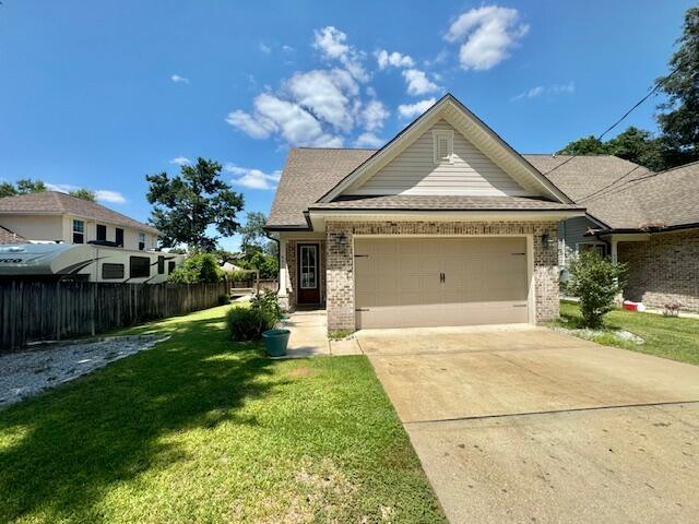 **Available July 4th!**This stunning 4-bedroom, 2.5-bathroom home offers a thoughtful layout with the primary suite conveniently located on the main floor, along with a half bath perfect for guests. The open floor plan is both inviting and functional, showcasing exquisite attention to detail and high-quality finishes throughout. The kitchen boasts 3cm granite countertops with ample cabinet and counter space, making it a chef's dream. French doors in the kitchen lead to your private patio, perfect for outdoor entertaining. Upstairs, you'll find a versatile loft area, along with three additional bedrooms and a full bathroom.