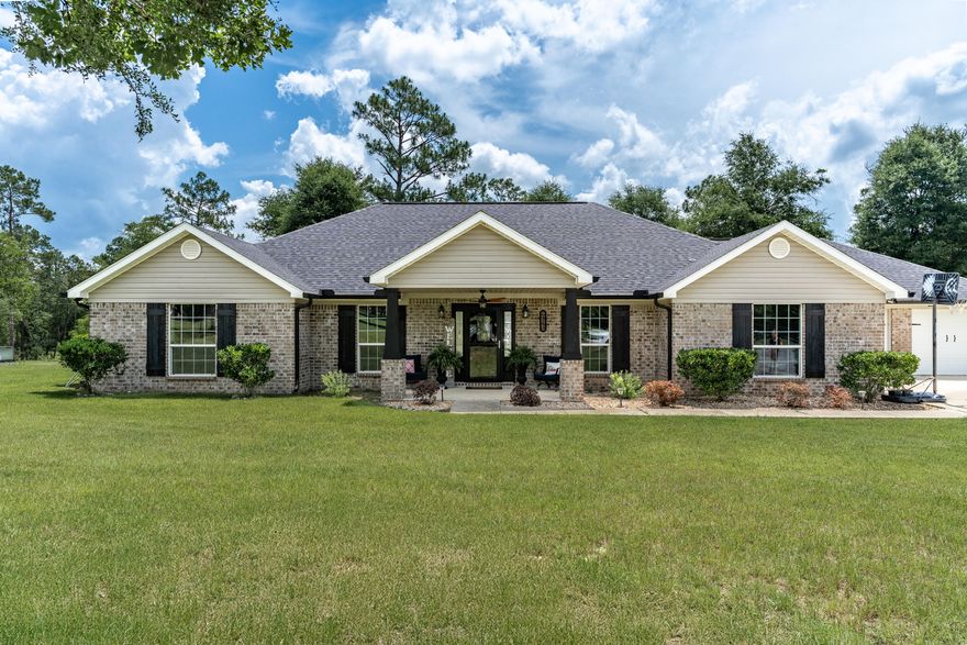 This property is a  horse lover's dream, providing everything you need to care for and train your horses.  The 24 acres offer plenty of lush pasture for grazing along with ample space for riding.  Completely fenced-in property backs up to Yellow River Water Management for privacy. The focal point of the property is the gorgeous brick home. This immaculate home boasts LVP flooring, granite, gas fireplace and an open floor plan. Plenty of room for family and friends to gather while the breakfast bar seats 6 comfortably. The kitchen is designed with ample granite counter space, custom cabinetry and overlooks the family room. A split floor plan provides privacy for the entire family. A Generac whole house generator will provide you with peace of mind. Step outside to discover your personal oasis:  an inground salted/heated pool which is perfect for cooling off on warm days and a hot tub for relaxing under the stars after a long ride. An outdoor shower is next to the pool for your convenience. The property has two wells, one measures 350' deep while the other is a spring well measuring 125'.  They are tied together.  A bubbling stream runs midway down the property.  Diverse wildlife frequents the wooded back portion of property..  .  This property is perfect for anyone seeking a peaceful, private retreat with plenty of space to roam.  