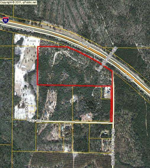 Vacant Land 41.5 Acres MOL (.5 Acre is on the north side of I-10). Seller reports a beautiful spring on the property and hard wood trees including magnolia and oak. Property is adjacent to I-10 on the north boundary. Berry Patch road is an asphalt millings covered road.