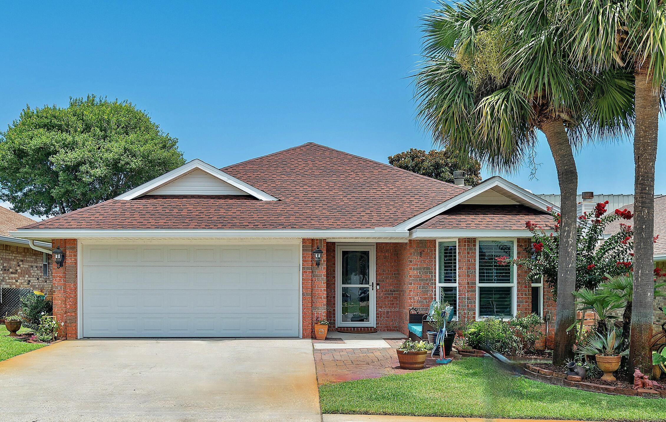 WOW! This immaculate Sunsail residence comes with Impact resistance windows, custom doors, plantation shutters, custom cabinets with soft close doors, granite countertops, subway tile backsplash, premium KitchenAid Duel Fuel Range, Farmhouse stainless steel kitchen sink, premium light fixtures and fireplace with coordinated subway tile, just to name a few. Located just blocks from the beach and the new Tarpon Gulf Front Park beach access, making it an ideal vacation rental or a great primary home. Rental projections up to 60K. Roof replaced in 2020 comes with a transferrable warranty.