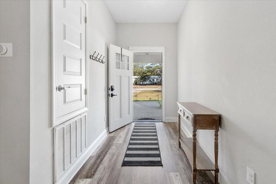 Welcome to your dream home! This stunning 2019 build boasts contemporary elegance and modern convenience, all nestled on a generous .46 acre lot with no HOA fees. With 3 bedrooms and 2 baths, this home offers the perfect blend of comfort and style.Step inside to discover an inviting interior featuring luxurious granite countertops, complemented by durable and chic LVP and tile floors throughout. The neutral grey palate sets a serene ambiance, providing the ideal backdrop for any decor style. Entertain with ease in the spacious living areas, where abundant natural light fills the open floor plan. Whip up culinary delights in the spacious kitchen, complete with stainless stainless steel appliances and ample cabinet space.Two guest bedrooms secluded from the master bedroom boasts grey  palates, with a touch of complimentary color; Retreat to the tranquil primary master bedroom suite, offering a serene oasis with a private en-suite bath, double modern vanities, and Tile flooring!  Two additional bedrooms provide versatility for guests, home offices, or hobbies.

Outside, the expansive .46 acre lot, completely fenced in, offers endless possibilities for outdoor enjoyment, from gardening to hosting gatherings under the stars. With no HOA fees, you have the freedom to make this space your own. This home is in immaculate condition and very well maintained by the owner. Big spacious dining and living room with easy access to the big back yard. Granite counter tops in the kitchen along side beautiful stainless steel appliances. This property resides in the heart of Navarre just off of highway 87. Hop in the car and arrive at beautiful Navarre Beach in 10 minutes! Schedule your showing today!

Conveniently located, this home offers easy access to local amenities, schools, parks, beaches and more. Don't miss your chance to experience the best of modern living in this impeccable 2019 build. Schedule your showing today!