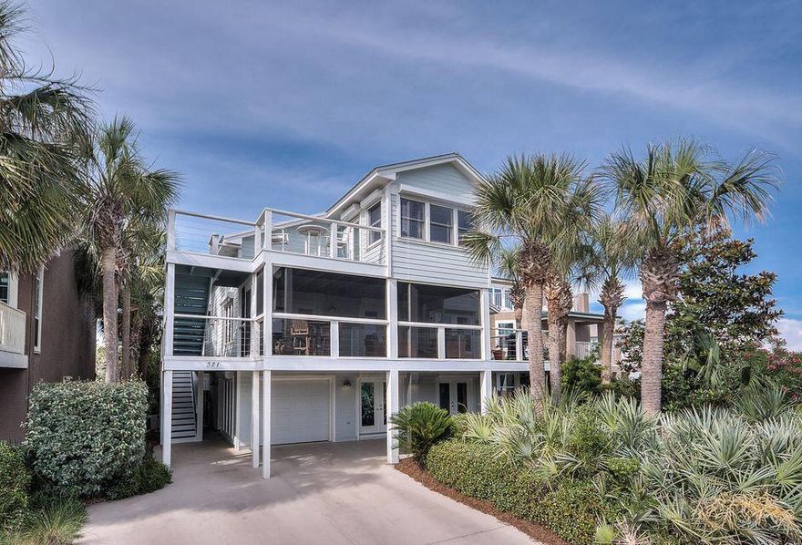 Offering a rare amount of privacy and space is this unique gulf view beach home in the gated Sand Cliffs community. Stunning beach views can be enjoyed from a series of covered balconies and outdoor spaces. The spacious private terrace surrounding the lagoon pool offers ample space for relaxing and entertaining within earshot of the surf breaking on the soft white sand. Buyer to verify all dimensions.