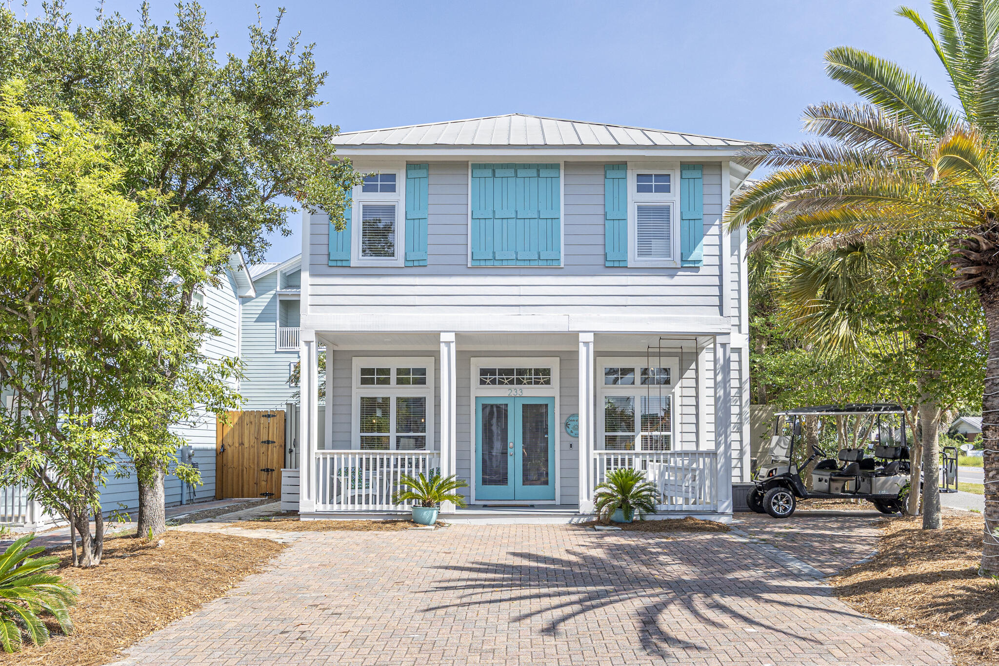Incredible opportunity to own this exceptional upscale 4-bedroom beach cottage in a prime location in Blue Mountain Beach, famous for its serene beaches, amazing elevations & lively local culture. This property is within walking distance to multiple beach accesses and many dining & entertainment options. The home has many new features including brand new luxury vinyl flooring throughout (2025), Trex front porch, incredible outdoor area complete with paver patio, fire table, bike, kayak & paddle board storage, outdoor shower, bistro lights & 10 ft. privacy fence. You have everything you need to enjoy true coastal living. This home has established rental income bringing in $104k for 2024 and over $80k YTD. With added bunks this home sleeps 12 & is being sold turn key with GOLF CART INCLUDED You will fall in love immediately with the charming beach vibes from the teal shutters and door paired with tropical landscaping. The home features a metal roof and hardiboard exterior and quintessential welcoming front porch with new swing. The open floor plan is ideal and there is plenty of room to relax in the living area. Brand new luxury vinyl floor extends throughout both levels and there is nice natural light. Access the back patio just past the kitchen if you want to enjoy dining outdoors under the stars along with the ambiance of the fire table and bistro lights. The granite breakfast bar is perfect for casual dining and the blue shiplap is a nice craftsman touch. Kitchen features updated lighting, stainless steel appliances and new modern subway tile backsplash was recently updated for a clean look. The downstairs bedroom is a nice convenience and offers a queen bed and new flooring plus direct access to a full bathroom. There is a dining area and mini fridge behind the living area and the upper level features the additional 3 bedrooms. The stairs were just updated to LVP with wood treads which is a vast improvement to the prior carpet. Three large windows (recently replaced) on the stairwell bring in great natural light and the landing area is a great conversation spot. The generously sized primary bedroom has brand new floors, a king bed, working station and newly added bunk room, making this area ideal for families. The elegant ensuite primary bathroom has updated Quartz double vanity and upscale walk-in shower with unique tile accent, rain shower head and glass surround. This floor also encompasses a guest room with two twin beds, smart TV and video games, an additional guest room with king bed, smart TV and direct access to the guest bathroom. Beautifully decorated with a subtle beach style decor, located in the highly prized vacation destination of 30A, and offering enough sleeping accommodations for larger groups...this home has generated nice rental income. The newly added & enclosed bunk room off the primary brings the square footage up to 1,924.
This home is nicely situated in a quiet neighborhood yet still right in the heart of the iconic 30A area of Blue Mountain Beach. Enjoy your time boating or fishing at Western Lake at Grayton Beach, hiking or biking the nature trails, or soaking up the warm Florida sun on the pristine beaches of the Gulf of Mexico. All of it just minutes away! There is a an easement to a beach just down the road and you have access to public beaches too at Highway 83 Blue Mountain access or Gulfview Heights access. You may even be able to join the amenity package at Village of Blue Mountain Beach (if available) for access to a pool, fitness center and shuffle board right across the way.
Blue Mountain Beach is also the highest elevation of Florida's Gulf Coast lending incredible views and beautiful natural dunes and wild flowers. Enjoy the great outdoors with the surrounding state parks, nature trials and the 22-mile bike & jogging path. Kayak or paddle board on one of the rare coastal dune lakes and experience a unique ecosystem that is only available to approximately 5 locations in the world! There are many options nearby for dining and entertainment and you are also close to Grayton Beach and Gulf Place. Do not miss out on this incredible opportunity to own a charming, one level home in Blue Mountain Beach. This is an ideal primary or second home to enjoy the coastal lifestyle or a prime rental investment if desired, with established rental income breaking $100k annually!
