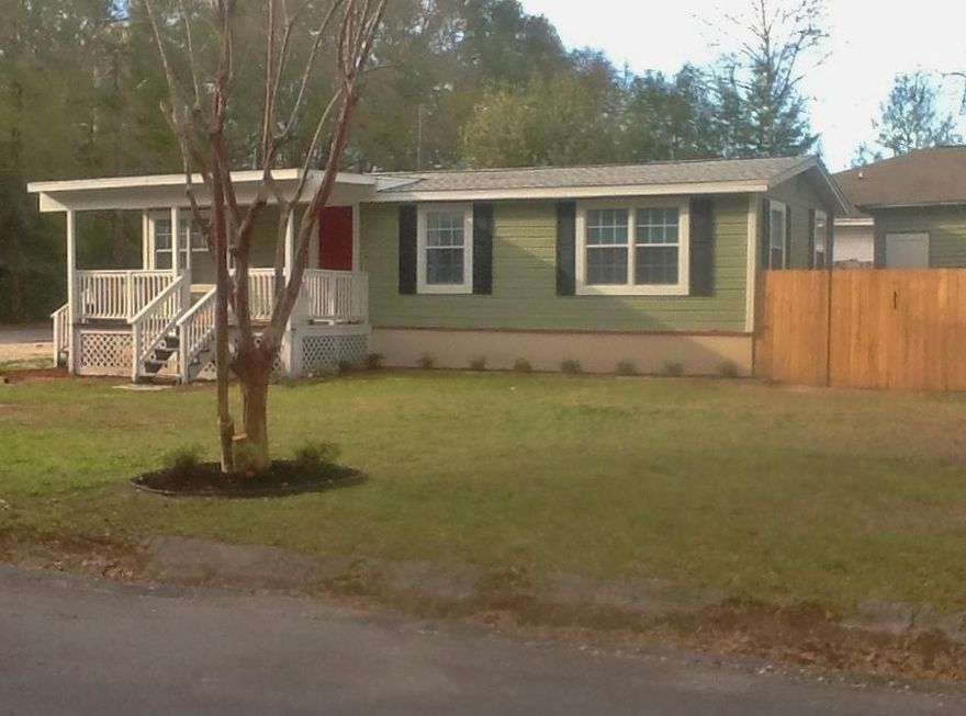 Adorable Florida Cottage with SO many possibilities! Zoned both Residential Single Family AND R2, for possible multi-family use. Sitting upon one of the largest lots on the block, this quaint home has been remodeled. Used as a rental, but perfect for full time owner. Cypress siding, privacy fenced yard with lawn pump and sprinkler system installed. Home has been overhauled with new windows, roof, A/C, sheet rock, copper wiring, plumbing, new kitchen and Laundry room added. Sit out on your covered front porch, or BBQ on the deck. A matching yard building holds your lawn equipment, etc. A sweet opportunity that rarely comes along. Home is being sold, ''As Is,'' as has been used only as a rental. Hurry and let your imagination soar!