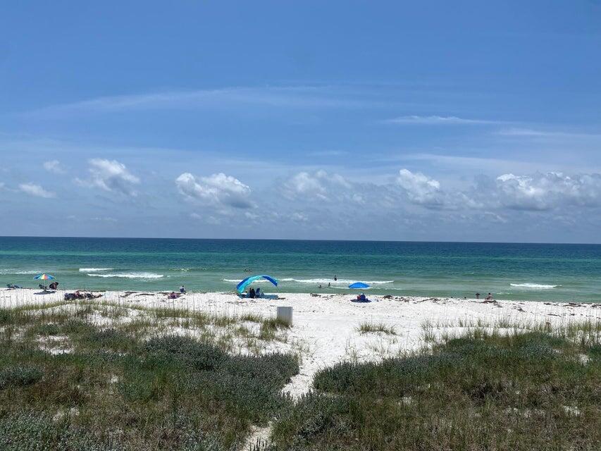Nestled in the heart of Seagrove Beach, this exceptional oversized Gulf-front lot offers a rare opportunity to craft the ultimate coastal retreat. This property is part of two parcels available for purchase, providing an impressive combined 60 ft of Gulf frontage by 510 feet deep lot and private beach extending to the mean high water line.(Adjoining lot MLS #977129) Positioned on the exclusive San Roy Road, a serene dead-end street, uniquely bordered by the breathtaking turquoise waters of the Gulf to the south and the tranquil Eastern Lake to the north.This rare positioning presents the best of both worlds with panoramic views of the Gulf's shimmering waters and the scenic beauty of Eastern Lake. Located south of 30A, this property is ideally situated in a quiet residential neighborhood, close to all the renowned communities of 30A with Seaside to the west and Alys Beach and Rosemary Beach to the east with the finest dining, specialty eateries and boutique shopping and the new Greenway Station is nearby featuring local favorites like Pecan Jack's Ice Creamery, the Salty Butcher, Wild Olives, and more. Envision your dream home on this expansive lot, which offers ample space for a custom build that meets current county building requirements of one parking space per 900 sq ft, there's plenty of room for a spacious home and necessary parking. For inspiration, a home two doors down built in 2024 on a 60' x 331' lot boasts over 9,807 sq ft of heated and cooled space, showcasing the possibilities for luxury living.
Note the position on the beach of the homes to the east and west allow for expanded views down the coastline.This unique lot also ensures privacy and tranquility, with the nearest public beach accesses at either end of the road. Whether you dream of a generational beach retreat or a high-income-producing investment property, this lot offers the flexibility to realize your vision.
Currently, the property includes a 3-bedroom, 2-bathroom 2,145 sq ft town-home, perfect for use as a beach getaway or short-term rental to generate revenue while you design your new home. The neighboring parcel also offers a 3-bedroom, 3-bathroom, 1,500 sq ft townhome, providing further accommodation options.(Both properties priced for beachfront lot value only). Please note that the seller requires both parcels to be under contract with a simultaneous closing.
Seize this unparalleled opportunity to create your dream home. Whether for personal enjoyment or investment, this Gulf-front lot is poised to become a crowning jewel in your real estate portfolio.