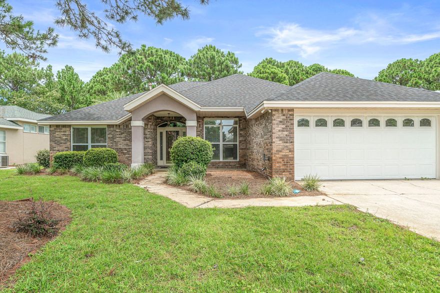 Sought after neighborhood! All brick home with new dimensional shingle roof installed June 2019, and new hvac installed May 2019. Enter the home to see beautiful wood floors in the foyer, main living area, hallways and formal dining room. The kitchen has granite counter tops with updated wood cabinetry and tumble tiled back splash in the kitchen, with a gas stove and black appliances. Tiled kitchen floors and in the large kitchen nook. Enjoy the gas fireplace with black granite surround accents. The split floor plan provides privacy for the master ensuite, with large walk in closet and built in shelving. The large master bath has his and hers vanities, garden tub and separate shower and separate powder room. Enjoy the screened in covered porch and extra decking, large back yard