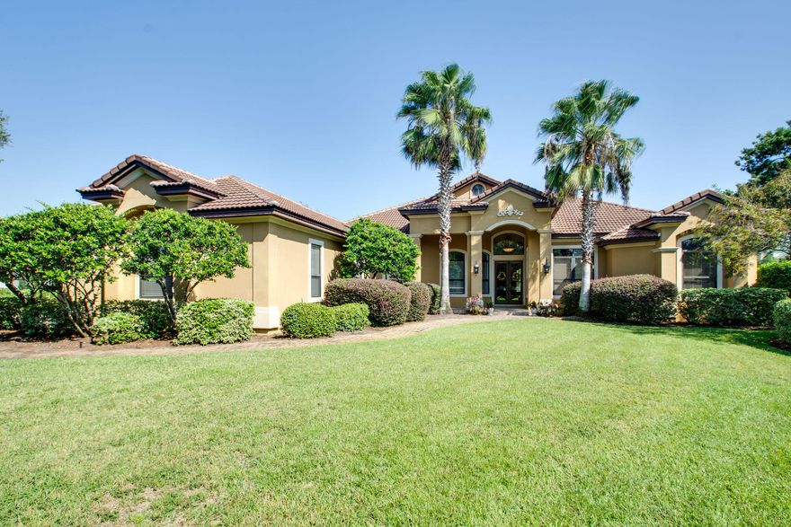 Beautiful custom home overlooking the 12th green and the 13th fairway in the highly desirable gated golf community of Kelly Plantation offering a spacious floor plan, quality construction and an eye for detail! Impressive entry with double doors open to the living (or dining room), an adjoining study, wet bar. Open concept leisure room/casual dining and gourmet kitchen with granite counters, loads of cabinetry, 48'' dual-fuel Dacor range, walk-in pantry. The luxurious master suite features a generously sized bedroom, with direct access to the lanai and pool, dual customized walk-in closets, dual vanities, private water closet, large walk-in shower and jetted tub. Three additional bedrooms, two full baths and one half bath are on the opposite side of the home. There's a large covered