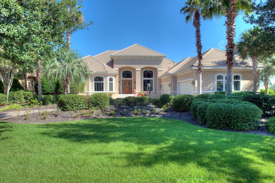 Significant price reduction! Motivated Seller says ''Bring us an offer!'' Stunning bayfront custom home in the desirable gated golf course community of Regatta Bay, meticulously designed and constructed with elegance, taste and comfort in mind. An impressive entrance foyer, with 16 foot ceilings, offer the first of many bayviews. Immediately to the right is the formal dining room, with trayed ceiling and faux finish. The living room is adjacent and features a custom Florida coral fireplace surround, trayed ceiling, recessed lighting and a large wet bar with wine cooler, ice maker, mounted cabinetry, antique brass hammered bar sink, marble top and room for several bar stools. The open kitchen/morning room/family room overlooks the lanai, pool and bay and is perfect for