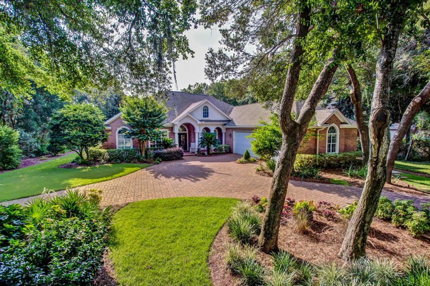 Years of careful planning and quality execution created a beautiful custom home that is simultaneously elegant, cheerful, practical, and inviting. And it's idyllically set on an amazing lakefront lotone of the few in Kelly Plantation!Upon entering the home, the eye is drawn across the open living area through the glass sliders to the sparkling lake beyond the fully enclosed lanai/pool/hot tub. The floorplan gives a sense of openness and spaciousness, yet with practical considerations, such as both formal and casual dining areas and a split bedroom floorplan to maximize privacy. Beautiful oak floors flow throughout the main rooms, with tile in the 3 full baths and laundry area. The eat-in kitchen, which has been upgraded with granite countertops and 2-year-old stainless appliances...