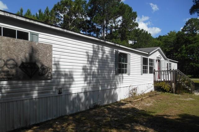 REO ~ Spacious 4 Bd / 2 Ba home conveniently located to Hulburt Field. The home offers a formal living room & den area with fireplace. The kitchen has plenty of cabinet space & a center island. The large master suite offers a sitting room, double vanity, garden tub & separate shower.