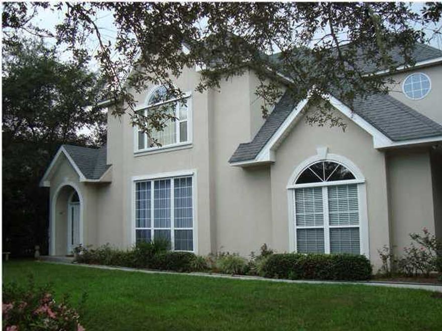 In Ground covered pool, steps to the beach! Visit the virtual tour http://fusion.realtourvision.com/62138 Traditional on the outside but WOW on the inside!Two story foyer and family room adjoins open kitchen with island and breakfast room, all viewing the enclosed heated in-ground pool area! Secondary living/dining can easily be converted to huge office.Private master on main with spacious bath and great walk in closet.Front AND back staircases. Well cared for one owner home, full time residents. The yard is fenced with mature landscape. Side entry oversized two car attached garage! Exterior is hardcoat stucco with elastimer finish. Minute walk to community beach access!Perfect primary residence or second home as neighborhood is primarily owner occupied or long term rentals, but short