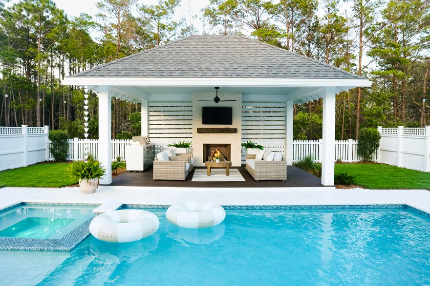 Welcome to 133 E Firethorn Circle, a coastal retreat nestled on a quiet street in the sought-after Watersound Origins community. This beautifully designed home offers the perfect blend of privacy, comfort, and resort-style living--just minutes from 30A and the beaches of South Walton.This fully furnished home with custom finishes features 5 spacious bedrooms and 4.5 bathrooms. The primary suite on the main floor features a spa-like ensuite with soaking tub and large walk-in closet. A private guest suite also resides downstairs, perfect for visiting family or in-laws. Every detail is meticulous from the designer furnishings to the plantation shutters, all you need to bring is your suitcase!Out back, your private oasis awaits--an oversized yard with a pine forest backdrop. A screened in porch overlooks the sparkling pool with sun shelf and spa. A large covered cabana features a gas fireplace and outdoor kitchen, ideal for year round entertaining or relaxing after a day at the beach. 

Live the Watersound Origins lifestyle with access to tennis courts, pickleball, golf, a fitness center, bike paths, parks, and a kayak launch. This is more than a homeit's a lifestyle.