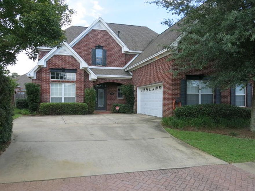 This immaculate majestic home in Ft. Walton has it all! The covered entry porch welcomes visitors. Nice foyer opens to front study/living room with a natural gas fireplace flanked on each side with built-in cabinetry & modified cathedral ceiling. Separate dining room with trey ceiling with hidden rope lighting. Fantastic gourmet kitchen with LOTS of cabinets plus a pantry, Silestone granite countertop with stainless steel sink, quality appliances including down-draft cooktop & wall oven/microwave, spacious nook with bay windows & french door to lanai. Family room boasts corner natural gas fireplace & vaulted ceiling to second floor. Wonderful master suite offers romantic trey with hidden rope lighting & bay-windowed sitting area with french door to rear lanai. Bath features his-&-her vanit vanities, garden whirlpool tub, and separate shower. The first floor utility houses both washer & dryer (which are "as is")plus a 5 ft cabinet unit with sink & plenty of space for folding clothes, etc. Garage features a second refrigerator that is "as is". The second floor offers three spacious bedrooms, each with a walk-in closet and two full baths. Beautiful community pool. Owner will consider pets on a case by case bases with a $250 Non-refundable pet deposit. No smoking.