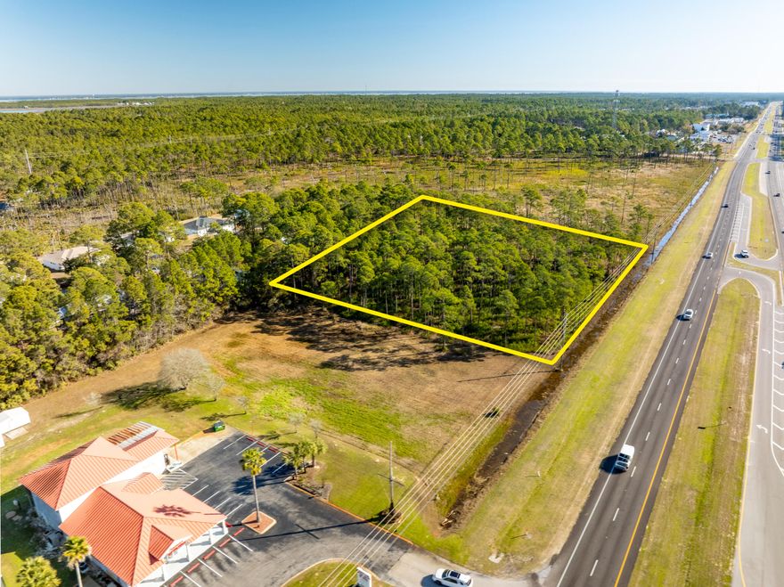 NEW LISTING of Prime Commercial Vacant Land in Santa Rosa Beach, Florida! This +/-2.118-acre site spans +/-279' along Highway 98, adjacent to Shrimpers Seafood to the West, and adjacent to the East is +/-145 acres of State Forest. Zoned Village Mixed Use, this acreage offers a multitude of viable end-uses. The current conceptual site plan illustrates a medical facility and a separate pharmacy building with a drive-thru. The civil engineering for ingress and egress is superb, offering a deceleration lane and median cross-cut for the benefit of Eastward-bound traffic. Please inquire for further details.