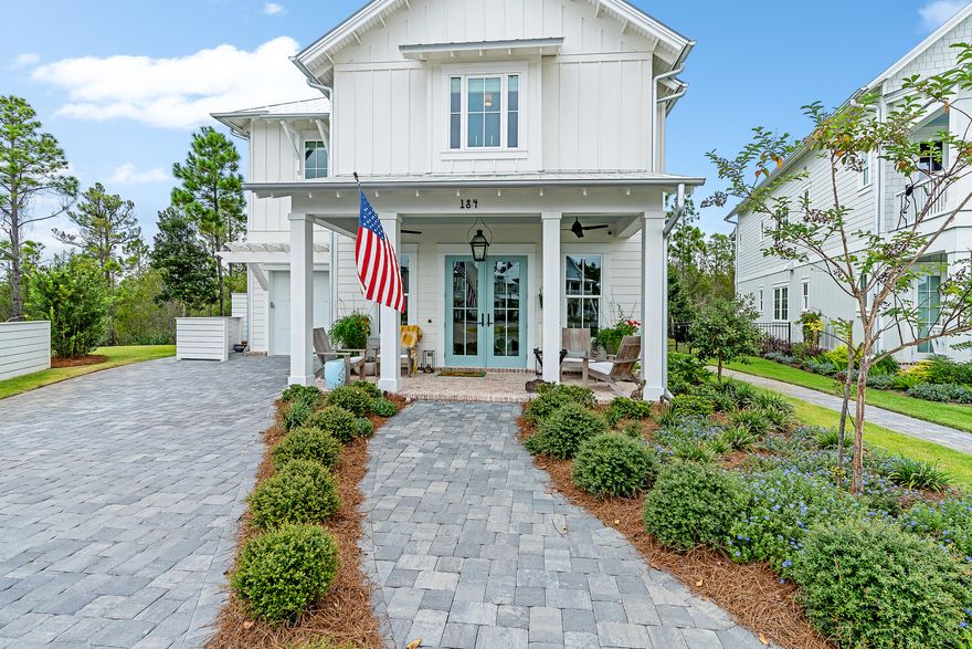 Tucked away in a small enclave of 38 homes in a quiet, gated, no short-term rental community sits this beautiful custom home.  The house features 3 outdoor living spaces; generous front porch overlooking the community water fountain, screened-in back porch with outdoor kitchen overlooking the elegant private pool as well as a relaxing, covered porch off the Main Bedroom with serene views of wets lands.  Luxury features can be found throughout the home.  The open, main living area has a beautiful horizontal brick fireplace and wine bar.  The stunning kitchen is bright and airy and has cabinetry to the ceiling, floating shelves with the backsplash covering the entire wall.  The huge Kitchen Island is perfect for entertainment. Appliances - Sub-Zero refrigerator, Wolf range, Cove dishwasher.