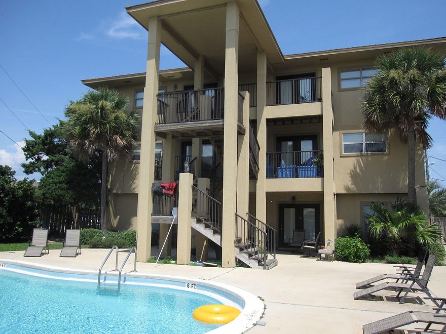 Upgraded 2 bedroom condo fully furnished turn key rental ready. NEW HEAVY DUTY A/C UNIT Top floor low density condo (only 6 units). Short term rentals allowed. Peak a boo views of beach and intercoastal waterway. This unit has many upgrades, crown moulding, granite kitchen counter tops, stainless kitchen appliances, tile is all areas except bedrooms and the carpet in there is less than 2 years old, a dedicated parking spot. Great primary, second home or vacation rental. This unit has been a second home and is in immaculate condition. HVAC 2 years old, - beautifully furnished. Unit has a stackable washer/dryer combo. RENTAL READY!! short term rentals allowed, short walk to the public beach access and the complex has a nice pool to enjoy. This won't last long best value on Okaloosa Islan