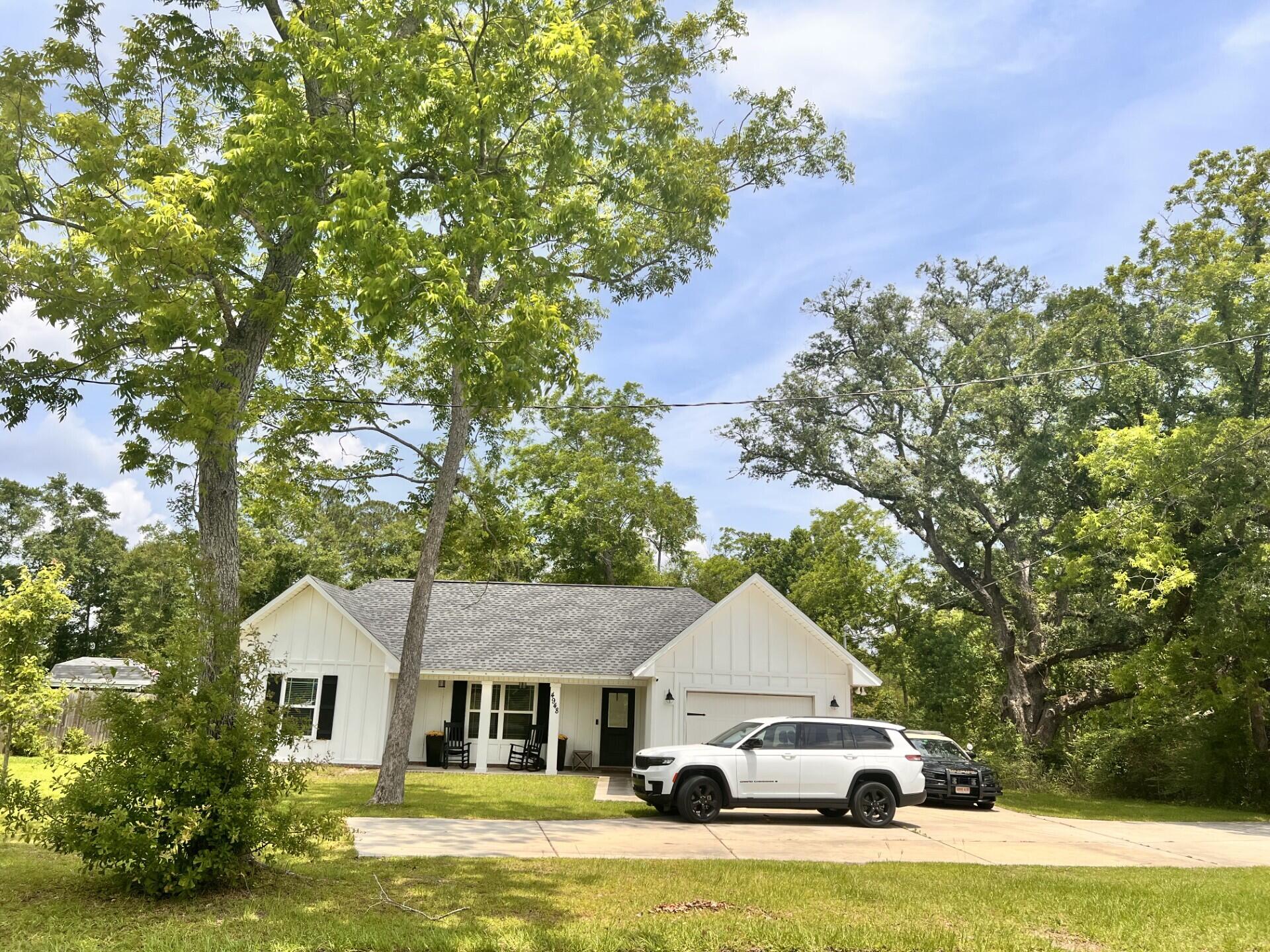 Come see this beautiful, brick and hardi-plank 3 bedroom, 2 bathroom home. You will absolutely love the OPEN floor plan, which sits on 1.455 acres. The builder installed stainless steel appliances, upgraded lighting package and LVP vinyl plank flooring throughout the home. The flooring is great for the pets and anyone who has allergies, not to mention easy maintenance. The partially wooded lot affords plenty of privacy and space and is zoned Rural Residential Agricultural (AG-RR) which allows for freedom to use the property for small-scale agricultural activities such as a plant nursery, raising animals or utilizing separate storage facilities for those agricultural needs. Enjoy the garage and extra parking spaces this home provides and a large lot for the children and fur babies. will be clearing more of the property in the back this coming week. Call today to come view this stunning home! It won't last long!