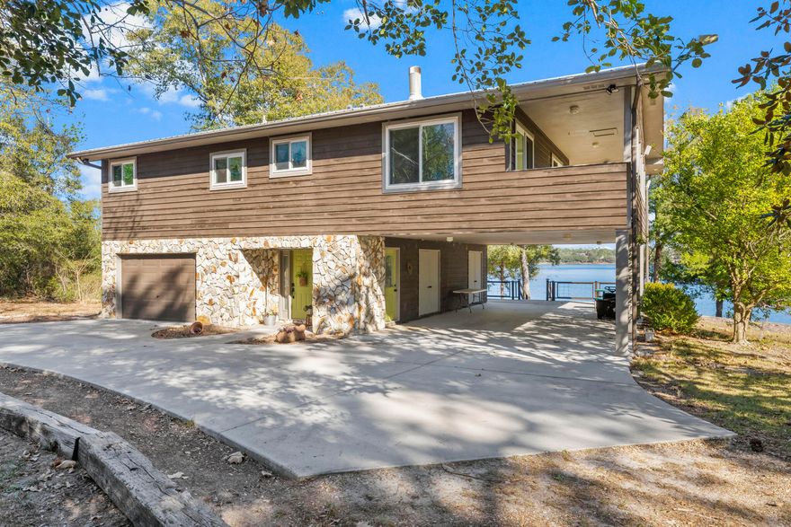 A CAPTIVATING CRAFTSMAN RETREAT - LAKEFRONT SERENITY AWAITSImmerse yourself in the tranquility of this fully updated 3-bed, 3-bath Craftsman home nestled on 1.12 acres of pristine lakefront. With 81 ft of waterfront, enjoy spectacular sunrises over the lake from the wrap-around upper deck or the private deck off the main bedroom. This 2,100 sq.ft. haven boasts a symphony of natural light through new windows and sliding doors, enhancing the modern kitchen and spacious living areas that spill out onto a shaded large lower deck -- an entertainer's dream. Retreat to a peaceful country setting with gated community exclusivity, minutes away from Bay County beaches, Pier Park, and everyday conveniences in Chipley. Don't let this lifestyle upgrade slip through your fingers. Contact us today!