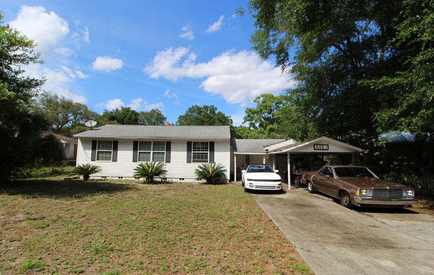 LOOKING FOR A STARTER HOME OR DOWNSIZING? Nice home situated on a large lot in a great neighborhood within walking distance to Garniers Beach Park on the water with beach access for swimming and a boat ramp. Light and bright living area that opens through a decorative arched entry into the dining room. Dining area has tile flooring, built-in shelving and sliding glass doors to the backyard. Kitchen is connected to the laundry room. Large family room with tile flooring throughout and built-ins. Come see the potential this home has with a little paint and flooring you can built equity. Conveniently located to shopping, schools, restaurants, beaches, downtown Fort Walton Beach and both Hurlburt and Eglin AFB. Call today to schedule a showing...