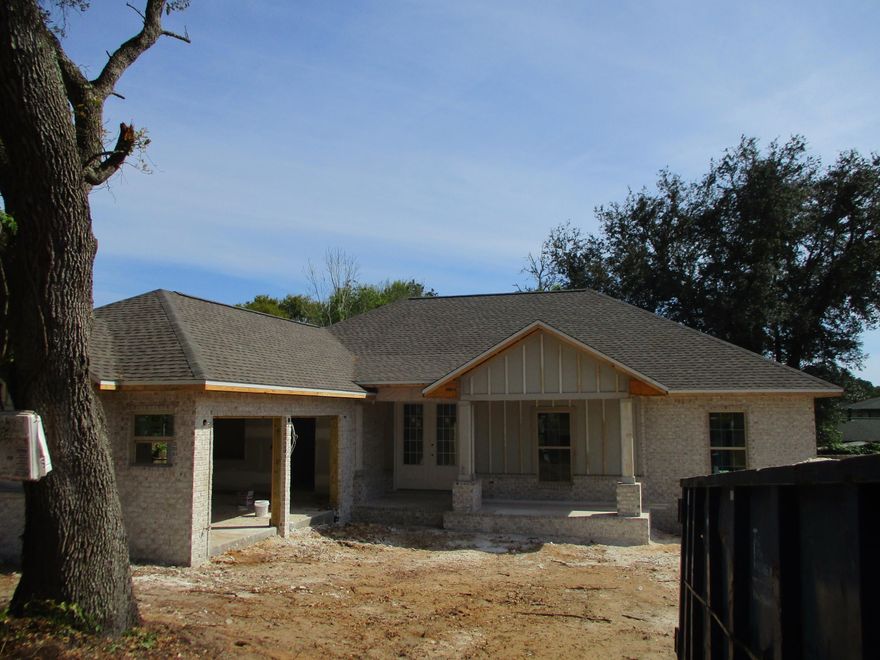 Great location, directly across the street from Longwood Elementary. 9' perimeter ceilings, 10' center ceilings, treyed ceiling in master bedroom, coffered ceiling in living room. Upgraded finishes throughout to include: large woodplank tile in living areas, white quartzite counters, white shaker cabinets n(softclose doors and drawers), gas range, gas Rinnai tankless water heater, gas log fireplace, vented wood hood, 7.25'' baseboards, crown moulding in living areas/master bedroom, custom tile walk in shower in master bathroom, cultured marble tubs/surrounds, jack and jill bathroom, dual vanities in both full bathrooms, fabric shield window coverings for hurricane protection, etc... Home is currently under construction, estimated completion mid-end of May.
