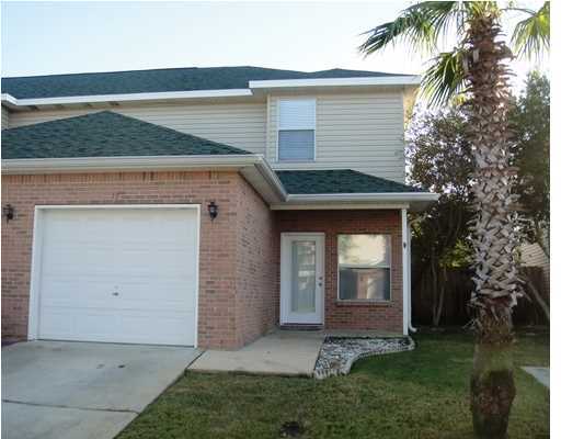This lovely 2BD/2.5BA Destin townhome features two levels with tile flooring downstairs in the living areas and carpet upstairs in the bedrooms. Enjoy the space of a large master bedroom, as well as a garage that has been converted, perfect as an office or playroom. Please note this property has limited parking available, best suited for one vehicle. You will enjoy the fenced back yard as well as the community pool of the complex. Trash service is included with your rent. Pets under 25 pounds allowed with owner approval.