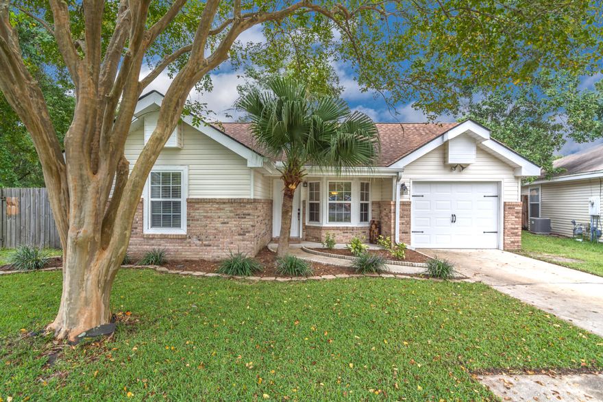 Welcome home to this charming and ideally located Florida cottage! Nestled at the back of an established Fort Walton Beach neighborhood with county-owned green space behind, enjoy an easy commute to Hurlburt Field, Eglin AFB, Duke Field, 7th Group, and Northwest Florida State College Fort Walton Campus. Mature shade trees and landscaping enhance the front yard and fully fenced backyard. The interior layout makes excellent use of space with an open concept, central living/dining/kitchen area and a split bedroom design. Recent updates include interior paint, bathroom fixtures and vanities, painted kitchen cabinets and stone backsplash, windows, garage door, garage door opener, epoxy-coated garage floors, and a NEW 40-gallon water heater. Don't wait - call this low maintenance bungalow yours!