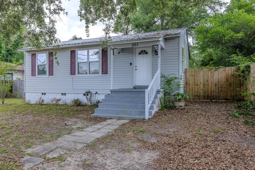 Great investment property! Charming 2 bedroom, 1 bath home located just off of Navy Blvd, offering easy access  to NAS Pensacola and nearby amenities.  This income producing property features a unique cellar space - perfect for storage, a workshop, or creative use.  Whether you are looking for a personal residence or a solid investment opportunity, this home combines convenience, character, and potential in one location.